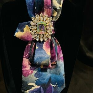 Elegant Floral Brooch with Crystal Accents